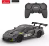 A remote-controlled Porsche 911 GT2 RS Clubsport 25 car and its remote control are displayed against a white background. Podgląd zdjęcia produktu