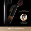 A close-up of a vacuum cleaner's dirt and liquid collection tank, with text highlighting its features. Produktbild-Vorschau