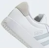 A close-up view of the heel and side of a white Adidas sneaker. Produktbild-Vorschau
