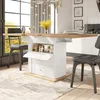A dining table with storage is shown in a kitchen or dining area, with chairs around it. Produktbild-Vorschau
