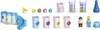 A collection of toy pieces, including a small castle with a slide, various tubes, figures, and accessories, arranged on a white background. Produktbild-Vorschau
