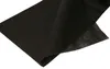 A black piece of fabric, likely weed control fabric, is shown laid out on a white background. Anteprima dell’immagine prodotto