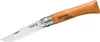 A single Opinel folding knife with a wooden handle and a steel blade is shown against a white background. Podgląd zdjęcia produktu