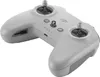 A light gray drone remote control with two joysticks and several buttons is shown against a white background. Voir les images du produit