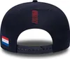 The back of a navy blue baseball cap with a Dutch flag patch on the left side and red stripes on the back. Produktbild-Vorschau