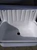 A white sink with a drain hole in the center. Náhled obrázku produktu