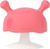 A pink mushroom-shaped teether with a white base, isolated on a white background. Voir les images du produit