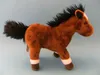 A plush toy horse on a plain background. Produktbild-Vorschau