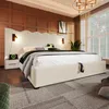 A bedroom scene with a large bed as the focal point, featuring a modern design and ambient lighting. Produktbild-Vorschau