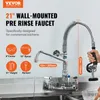 A commercial kitchen faucet is shown mounted on a wall, with water flowing into a sink. Produktbild-Vorschau