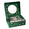 An open green advent calendar box with a mirror inside and festive decorations. Produktbild-Vorschau