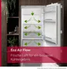 Interior of a refrigerator with air flow arrows and text overlay. Produktbild-Vorschau