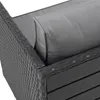 A close-up view of the corner of an outdoor seating set, showing the woven polyrattan material and a gray cushion. Produktbild-Vorschau