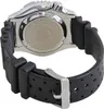 The back of a watch with a black rubber strap and a silver buckle. Produktbild-Vorschau