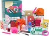 A collection of beauty products, including skincare, makeup, and accessories, arranged around a Sephora advent calendar. Produktbild-Vorschau