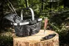A mushroom foraging set is placed on a tree stump in a forest. Podgląd zdjęcia produktu