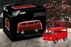 A Revell VW T2 model kit box and a built model are displayed on a wooden surface with a Christmas tree and gifts in the background. Produktbild-Vorschau