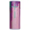 A cylindrical speaker with a colorful, abstract pattern. Produktbild-Vorschau