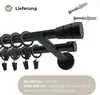 A close-up view of a black double curtain rod with rings and clips, along with mounting hardware and descriptive text. Produktbild-Vorschau