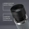 Close-up view of the top part of a travel mug, highlighting its lid and screw mechanism. Náhľad obrázku produktu
