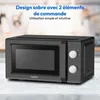 A black Medion microwave oven is shown on a white marble countertop with a blurred background. Anteprima dell’immagine prodotto