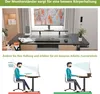 A desk setup with a monitor stand and an illustration showing proper posture. Produktbild-Vorschau