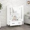 A white highboard with glass doors and drawers is shown in a room with a brick wall. Náhled obrázku produktu