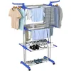 A multi-tiered drying rack with clothes and shoes on it, set against a white background. Produktbild-Vorschau