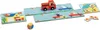 A children's board game with a fire truck, cars, houses, and a die. Voir les images du produit