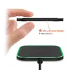 A hand is shown holding a thin, black wireless charging pad with a green LED light around the edge. Text indicates it is an "Ultra dünnes Design: 7 mm schmal". Below, the charging pad is shown plugged in and illuminated. Produktbild-Vorschau