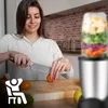 A woman is preparing ingredients for a smoothie in a kitchen. Produktbild-Vorschau
