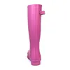 A single pink boot shown from the side against a white background. Náhled obrázku produktu