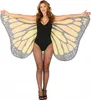 A woman wearing a black leotard and fishnet stockings is posing with large butterfly wings. Anteprima dell’immagine prodotto