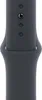 A close-up shot of a dark gray watch strap with visible pinholes and a clasp mechanism. Náhľad obrázku produktu