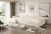 A modern living room with a large sectional sofa, coffee table, and artwork on the wall. Produktbild-Vorschau
