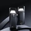 Two black power banks with integrated lights are displayed on a dark, curved surface against a black background. Produktbild-Vorschau