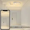 A hallway with a modern ceiling light and a phone displaying the same light. Produktbild-Vorschau