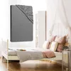 A bedroom scene with a bed, pillows, and a fitted sheet displayed on the wall. Produktbild-Vorschau