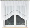 A white lace curtain hanging over a window. Náhľad obrázku produktu