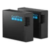 Two black GoPro dual battery chargers are shown side-by-side against a white background. Anteprima dell’immagine prodotto