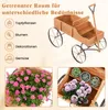 A wooden wagon planter with different sections, shown with various plants and flowers, and a list of potential uses. Voir les images du produit