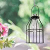 A solar lantern with a vintage look is hanging outdoors, with pink flowers and green foliage in the background. Náhľad obrázku produktu