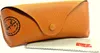 A brown leather glasses case with a cleaning cloth underneath. Produktbild-Vorschau