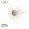 A gold sunburst mirror with dimensions indicated. Produktbild-Vorschau