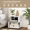 A white bedside table with decorative items and books. Podgląd zdjęcia produktu