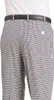 A close-up view of a person wearing checkered pants and a belt. Produktbild-Vorschau