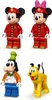 Four LEGO minifigures: Mickey Mouse and Minnie Mouse dressed as firefighters, Goofy dressed as a chef, and Pluto the dog. Produktbild-Vorschau