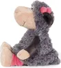A plush toy sheep sitting on a white background. Produktbild-Vorschau
