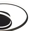 A close-up view of a modern black ceiling light with a white LED strip. Voir les images du produit