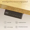 A close-up view of a black control panel for a height-adjustable desk, mounted under a wooden surface. The panel has a digital display and several buttons with icons and numbers. Below the desk panel, there are four circular icons with text descriptions of Produktbild-Vorschau